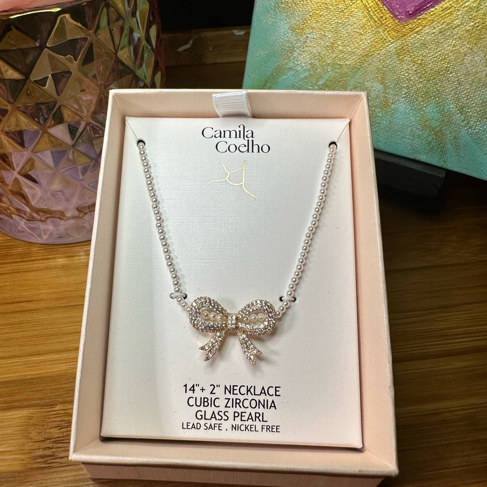 Camila Coelho Silver Cubic Zirconia Bow Necklace on strand of small faux pearls - Picture 10 of 10